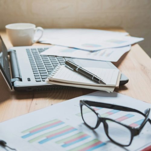 desk-office-with-marketing-graph-statistics-analysis-e1725446832143.jpg
